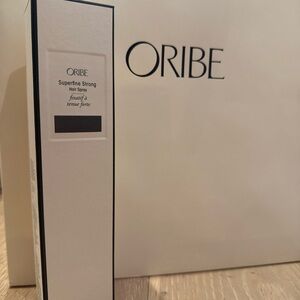 Oribe Superfine Strong Hair Spray in Black and White